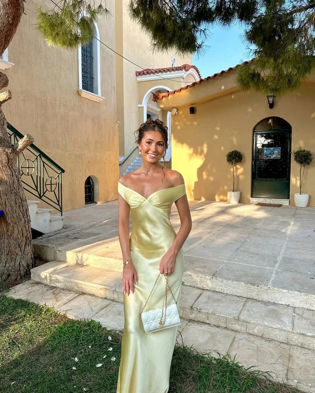 Yara Women’s Maxi Dress featuring an elegant off-the-shoulder design and a flowing silhouette, perfect for summer occasions and special events. 2