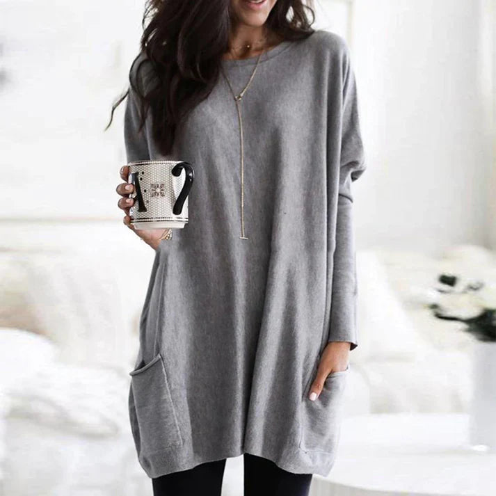 Zara women’s oversized sweater in warm autumn colors, featuring a cozy design perfect for fall fashion. 10