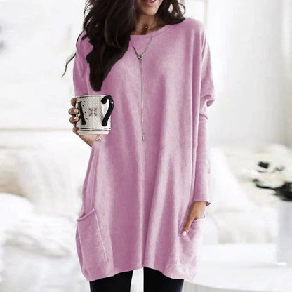 Zara women’s oversized sweater in warm autumn colors, featuring a cozy design perfect for fall fashion. 12