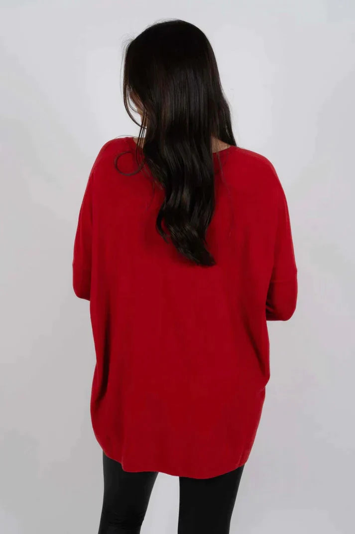 Zara women’s oversized sweater in warm autumn colors, featuring a cozy design perfect for fall fashion. 6
