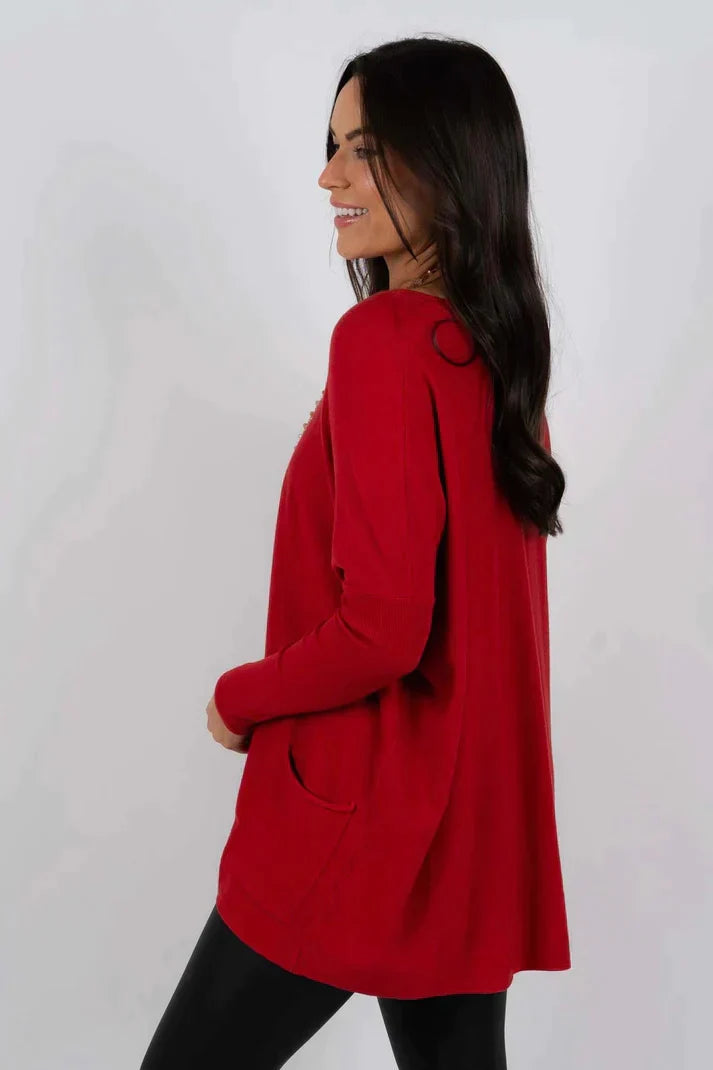 Zara women’s oversized sweater in warm autumn colors, featuring a cozy design perfect for fall fashion. 7