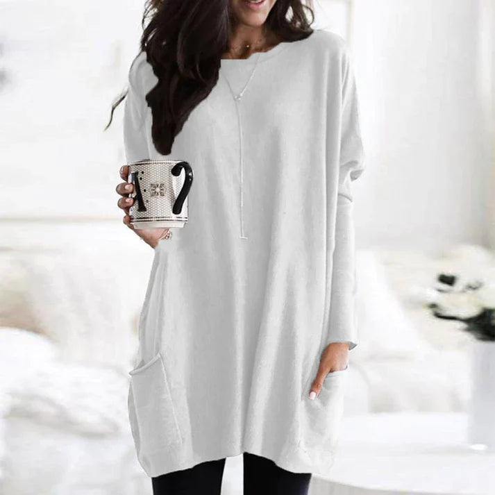 Zara women’s oversized sweater in warm autumn colors, featuring a cozy design perfect for fall fashion. 9